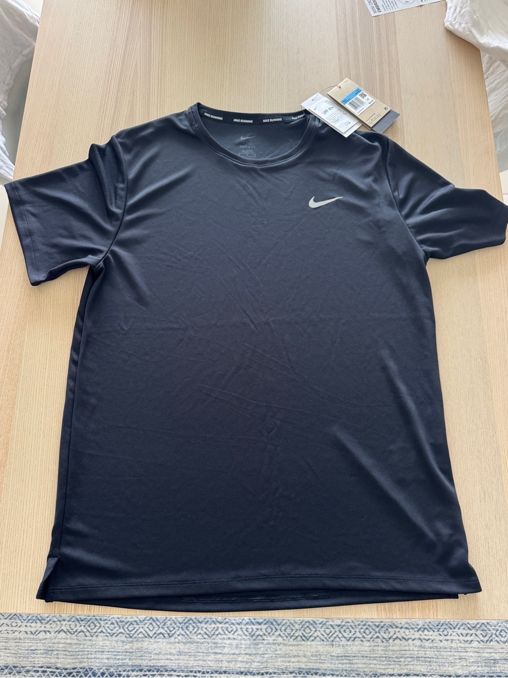 Nike Running Black Short-Sleeve Athletic Tee with Silver Swoosh